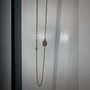 Athena designs gold link necklace with dusty rose stone pendant and evil eye